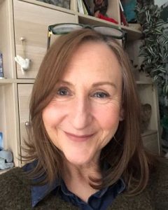 A headshot of Shelley